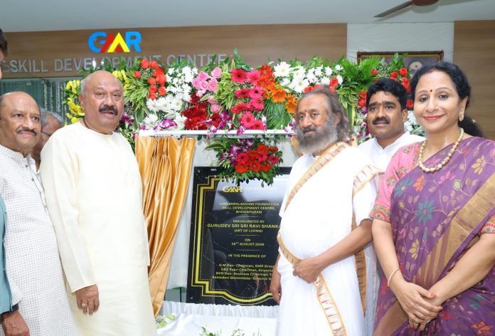 Sri Sri Ravi Shankar with GMR Group Chairman GM Rao at the GMRVF Skill Development Centre inauguration in Bhogapuram.